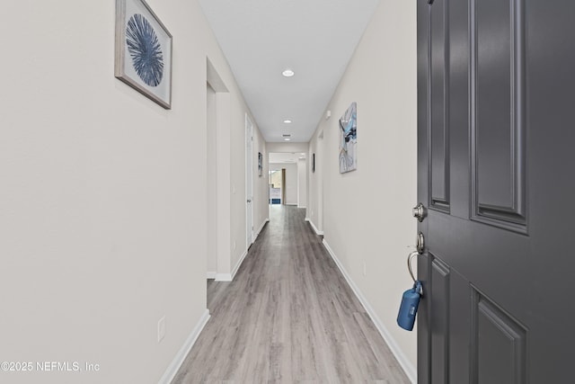 618 Honeycomb Trl, Saint Augustine, FL 32095 - corridor with light wood-style flooring, baseboards, and recessed lighting