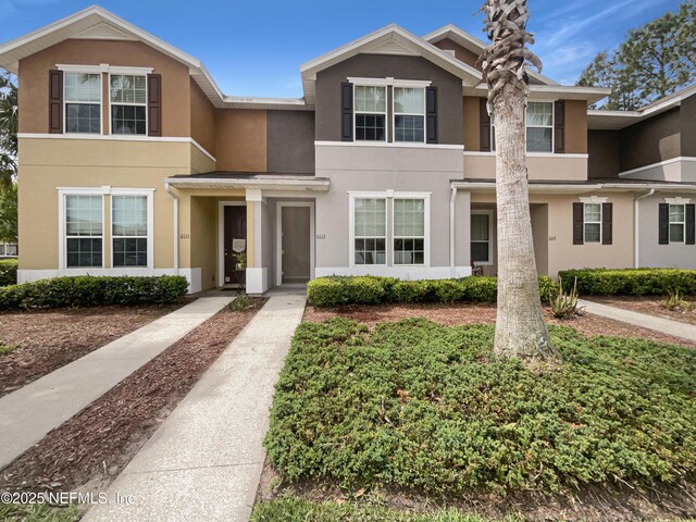 multi unit property featuring stucco siding