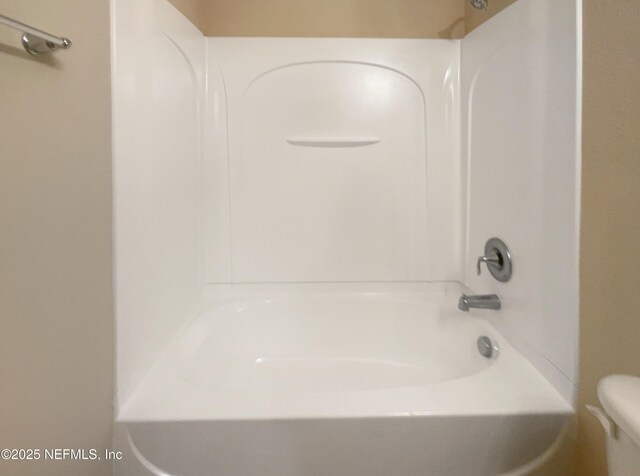 bathroom featuring toilet