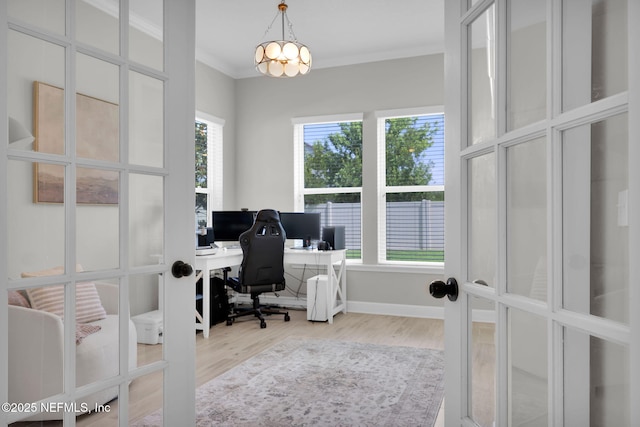 111 Bucktail Ave, Ponte Vedra, FL 32081 - home office with light wood-style floors, a chandelier, and french doors