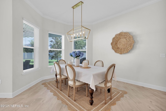 111 Bucktail Ave, Ponte Vedra, FL 32081 - dining room with crown molding, light wood finished floors, baseboards, and a chandelier