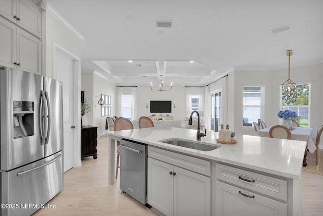 111 Bucktail Ave, Ponte Vedra, FL 32081 - kitchen with stainless steel appliances, a sink, light wood-type flooring, a chandelier, and coffered ceiling