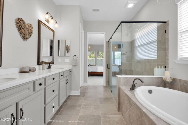 111 Bucktail Ave, Ponte Vedra, FL 32081 - full bath with a garden tub, double vanity, a shower stall, and tile patterned floors