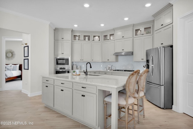 111 Bucktail Ave, Ponte Vedra, FL 32081 - kitchen featuring appliances with stainless steel finishes, a sink, baseboards, light wood finished floors, and recessed lighting