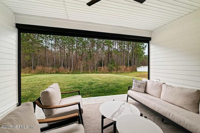 view of patio featuring an outdoor hangout area and ceiling fan
