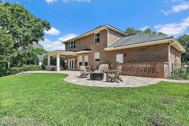 12768 Cattail Pond Cir S, Jacksonville, FL 32224 - rear view of property with brick siding, a patio, french doors, and a lawn