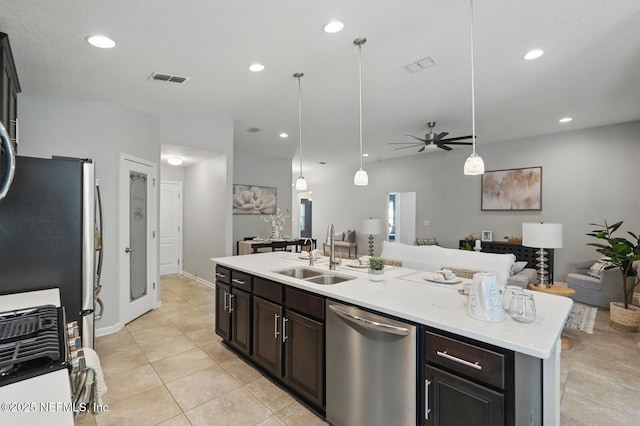 481 Fox Water Trl, Saint Augustine, FL 32086 - kitchen featuring a sink, stainless steel appliances, open floor plan, light countertops, and recessed lighting