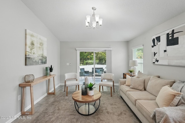 481 Fox Water Trl, Saint Augustine, FL 32086 - living area featuring a chandelier and baseboards