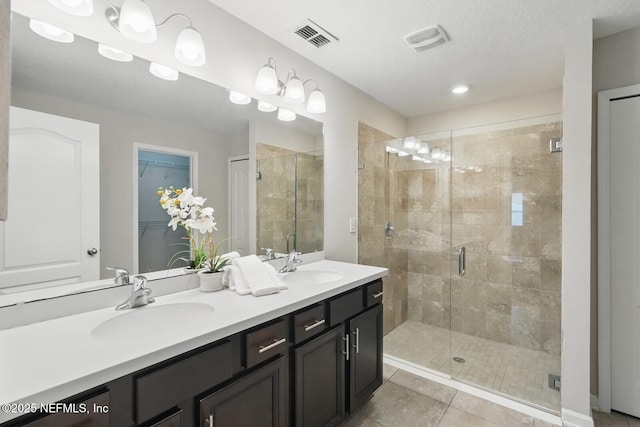 481 Fox Water Trl, Saint Augustine, FL 32086 - full bath featuring double vanity, a shower stall, and tile patterned floors