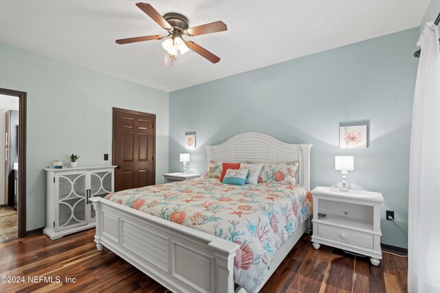 10961 Burnt Mill Rd Unit 1311, Jacksonville, FL 32256 - bedroom with dark wood-style flooring, baseboards, and ceiling fan