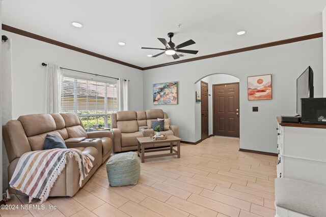 10961 Burnt Mill Rd Unit 1311, Jacksonville, FL 32256 - living room featuring ornamental molding, a ceiling fan, arched walkways, baseboards, and recessed lighting