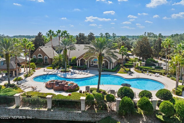 10961 Burnt Mill Rd Unit 1311, Jacksonville, FL 32256 - community pool with a patio area