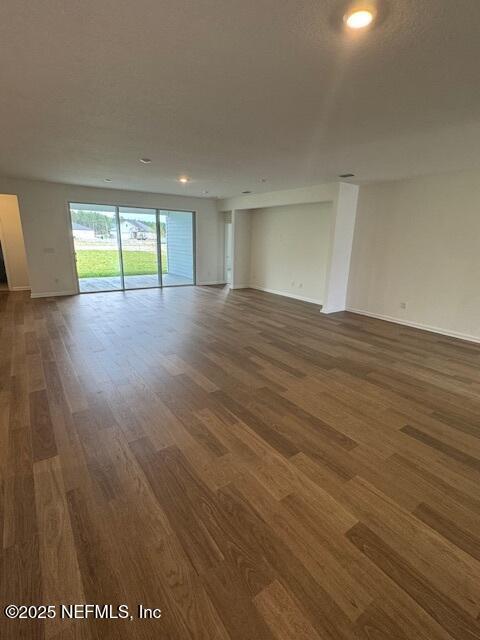 317 Archstone Way, Saint Augustine, FL 32092 - empty room with wood finished floors, baseboards, and recessed lighting