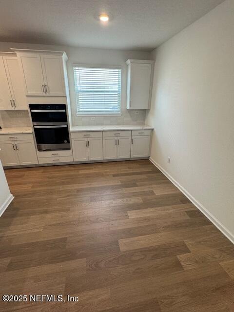 317 Archstone Way, Saint Augustine, FL 32092 - kitchen featuring decorative backsplash, light countertops, baseboards, and recessed lighting