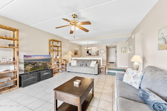 8550 A1A S Unit 14151, Saint Augustine, FL 32080 - living room with light tile patterned floors, ceiling fan, and a chandelier