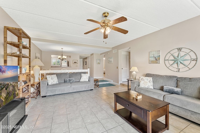 8550 A1A S Unit 14151, Saint Augustine, FL 32080 - living area with light tile patterned flooring, ceiling fan, a chandelier, a textured ceiling, and baseboards