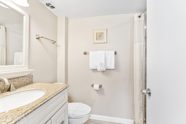 8550 A1A S Unit 14151, Saint Augustine, FL 32080 - full bath featuring vanity, toilet, baseboards, and a shower with curtain