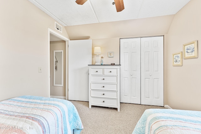 8550 A1A S Unit 14151, Saint Augustine, FL 32080 - bedroom with light carpet, a closet, and a ceiling fan