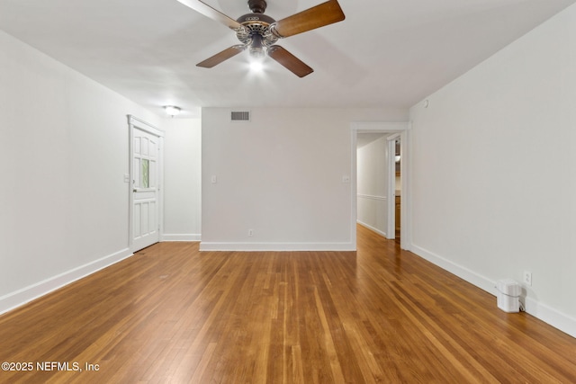 2520 Elbow Rd, Orange Park, FL 32073 - empty room featuring a ceiling fan, wood-type flooring, and baseboards