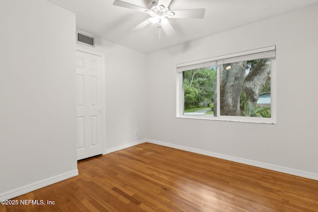 2520 Elbow Rd, Orange Park, FL 32073 - empty room featuring wood finished floors, baseboards, and ceiling fan