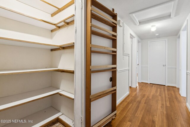 2520 Elbow Rd, Orange Park, FL 32073 - corridor with wood finished floors and attic access