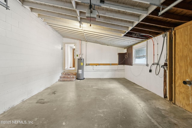 2520 Elbow Rd, Orange Park, FL 32073 - garage with water heater and a garage door opener