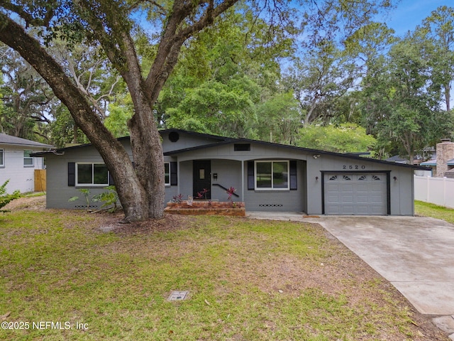 2520 Elbow Rd, Orange Park, FL 32073 - single story home with a garage, a porch, and driveway