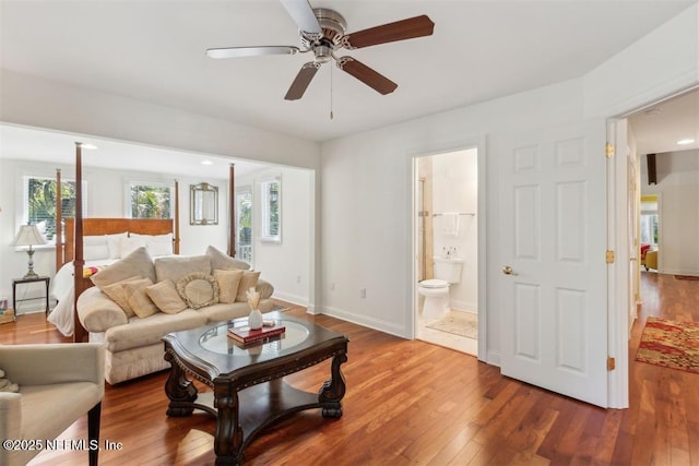3429 Sea Marsh Rd, Fernandina Beach, FL 32034 - living area with hardwood / wood-style floors, ceiling fan, and baseboards