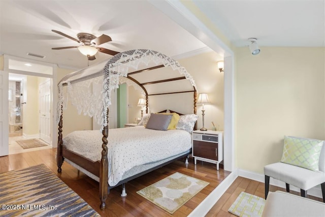3429 Sea Marsh Rd, Fernandina Beach, FL 32034 - bedroom with hardwood / wood-style flooring, baseboards, and ceiling fan