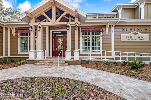 3429 Sea Marsh Rd, Fernandina Beach, FL 32034 - doorway to property featuring a porch and board and batten siding