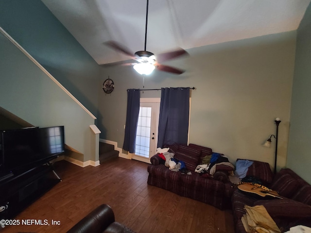8741 Whispering Pines Dr, Jacksonville, FL 32244 - living room featuring hardwood / wood-style floors, lofted ceiling, stairs, a ceiling fan, and baseboards