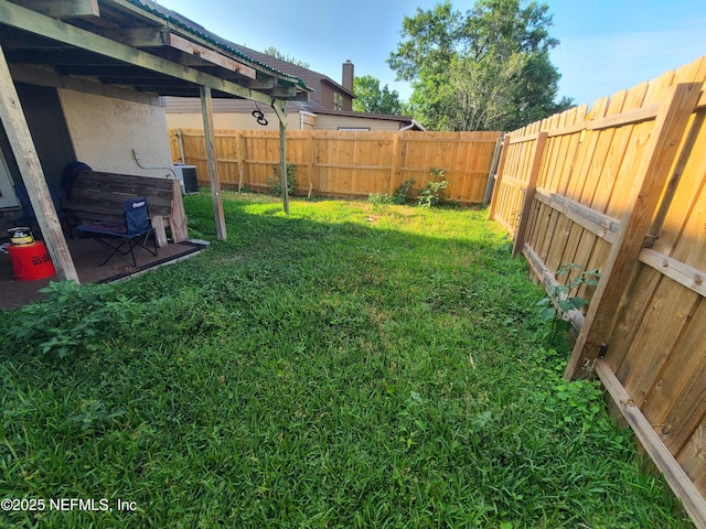 8741 Whispering Pines Dr, Jacksonville, FL 32244 - view of yard featuring central air condition unit