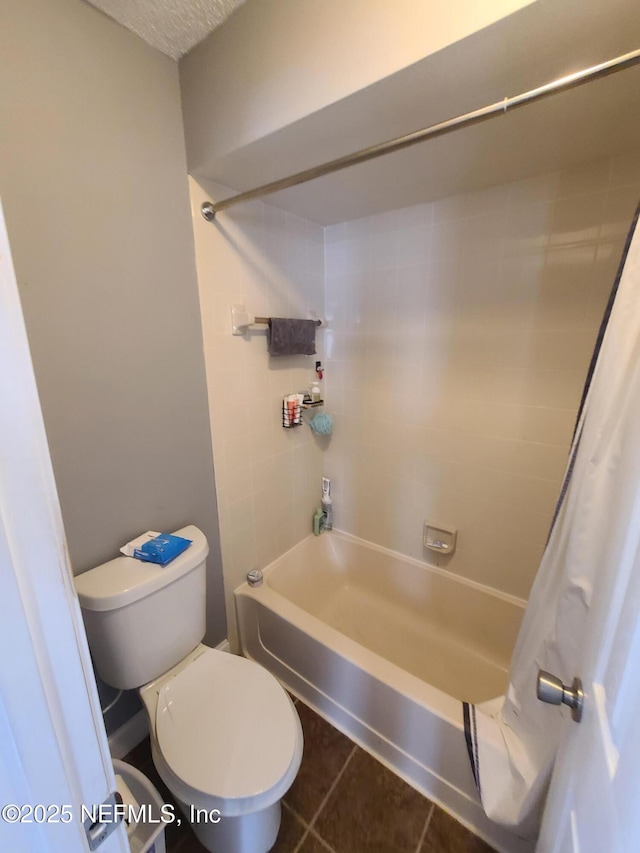 8741 Whispering Pines Dr, Jacksonville, FL 32244 - full bath featuring toilet, shower / bath combo, and tile patterned flooring