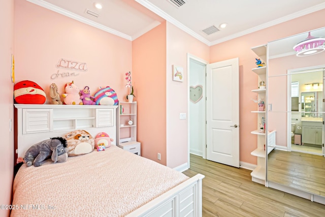 210 Terra Oaks Dr, Saint Johns, FL 32259 - bedroom featuring ornamental molding, light wood-style flooring, recessed lighting, and connected bathroom