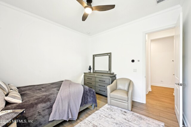 210 Terra Oaks Dr, Saint Johns, FL 32259 - bedroom with crown molding, wood finished floors, and a ceiling fan