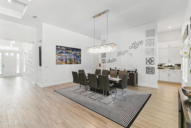 210 Terra Oaks Dr, Saint Johns, FL 32259 - dining room with light wood-style floors, recessed lighting, and a chandelier