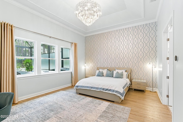 210 Terra Oaks Dr, Saint Johns, FL 32259 - bedroom featuring ornamental molding, a chandelier, light wood-style floors, and wallpapered walls