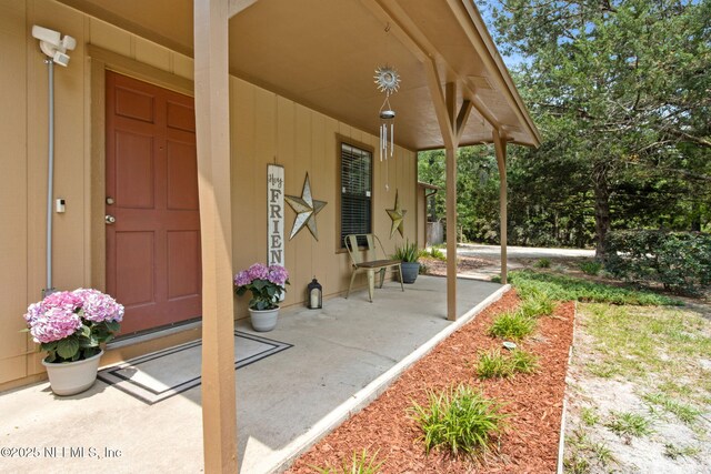 view of patio featuring a porch