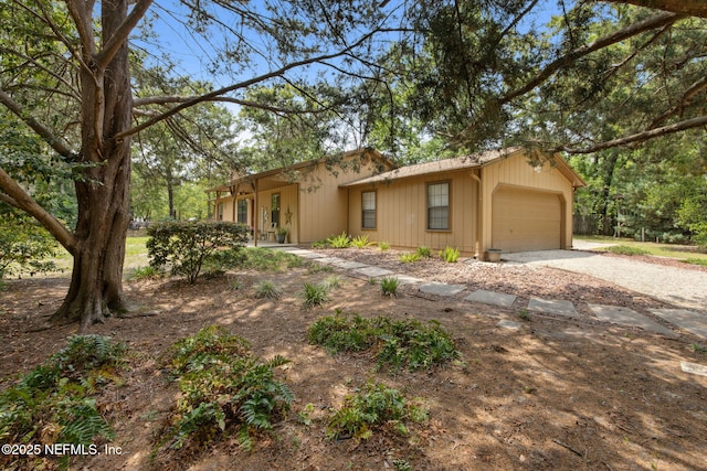 view of front facade with driveway and an attached garage