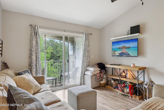 607 Golden Lake Loop, Saint Augustine, FL 32084 - living area featuring lofted ceiling and wood finished floors