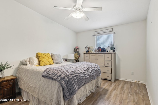 607 Golden Lake Loop, Saint Augustine, FL 32084 - bedroom with light wood finished floors, baseboards, ceiling fan, and lofted ceiling