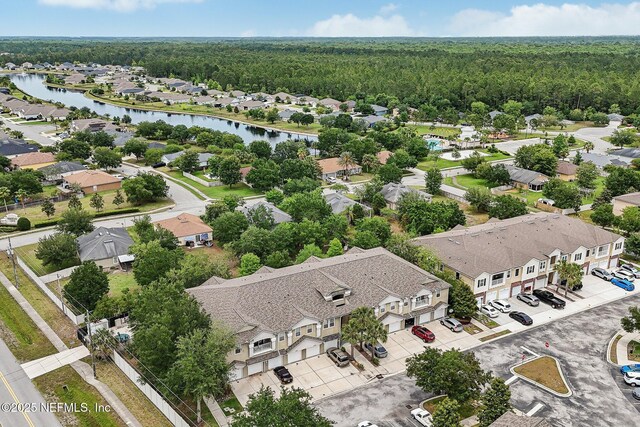 607 Golden Lake Loop, Saint Augustine, FL 32084 - aerial perspective of suburban area with a forest and a nearby body of water