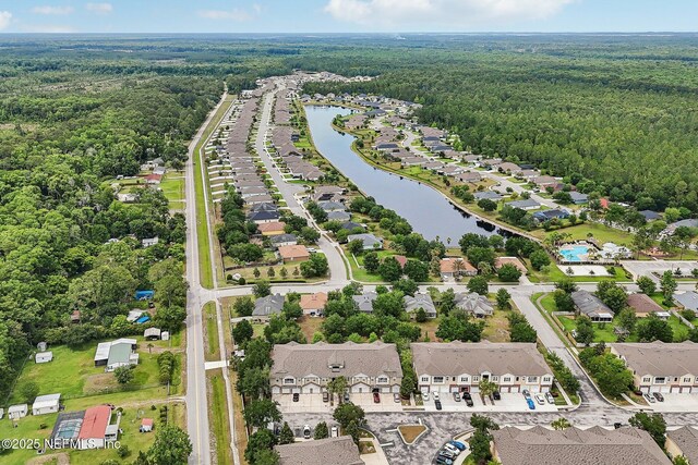 607 Golden Lake Loop, Saint Augustine, FL 32084 - aerial view of property's location featuring a forest, nearby suburban area, and a nearby body of water