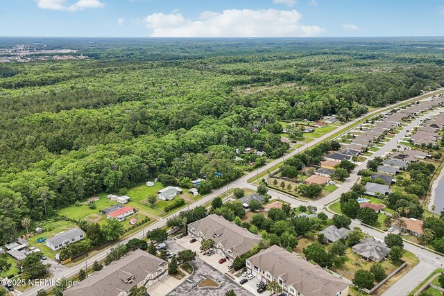 607 Golden Lake Loop, Saint Augustine, FL 32084 - aerial perspective of suburban area featuring a heavily wooded area