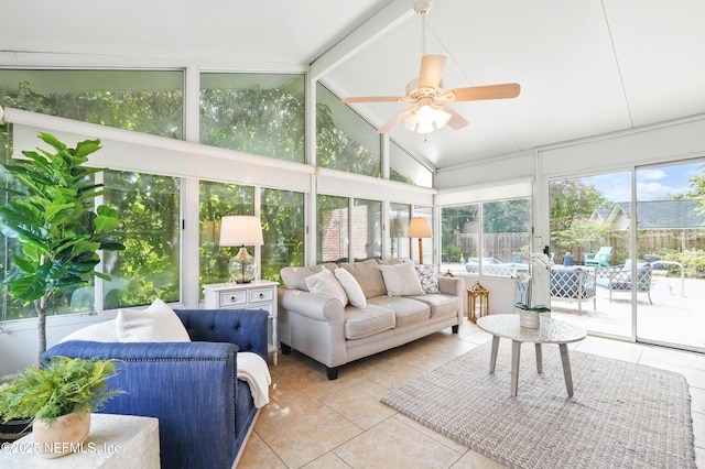 sunroom / solarium with outdoor lounge area, tile patterned floors, and ceiling fan