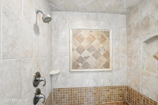 bathroom view of tiled shower