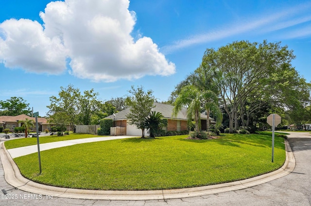 view of front of house featuring driveway and a garage