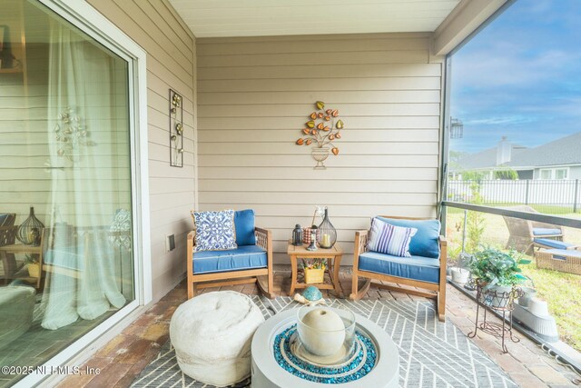 sunroom featuring plenty of natural light