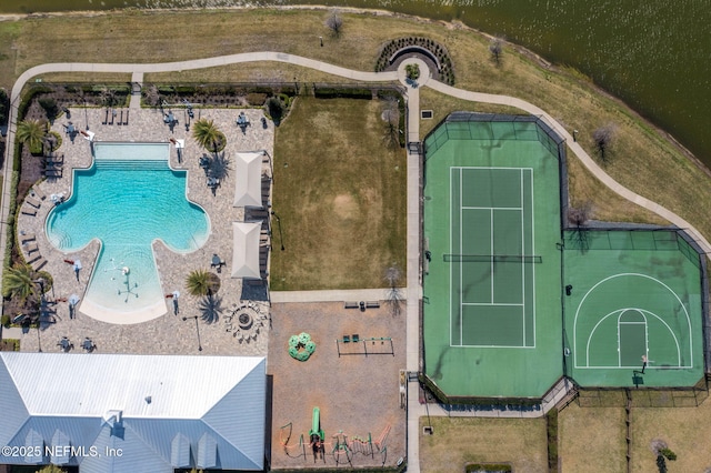 drone / aerial view of a pool