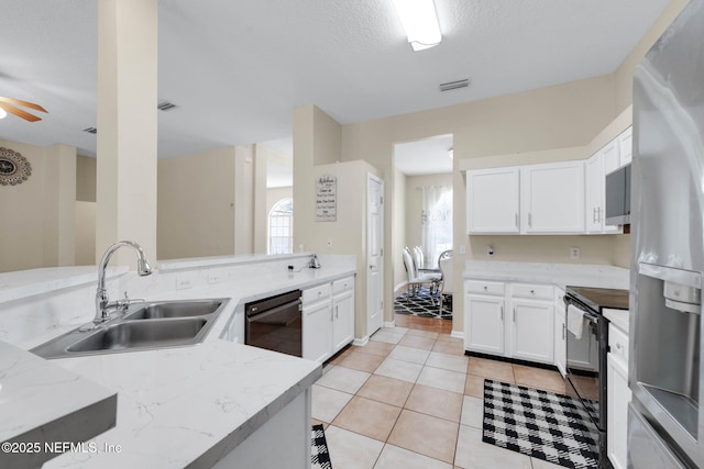 11658 Jerry Adam Ct, Jacksonville, FL 32218 - kitchen featuring stainless steel refrigerator with ice dispenser, a sink, black dishwasher, white cabinets, and plenty of natural light